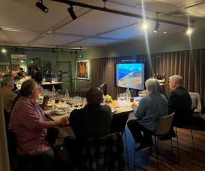 Guests attending a wine education class with Chris Cree